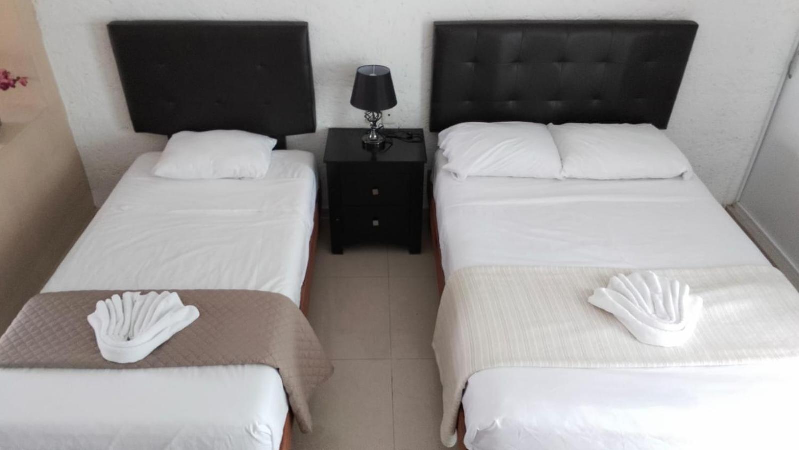 Hotel Dos Mundos, Isla Косумель Экстерьер фото