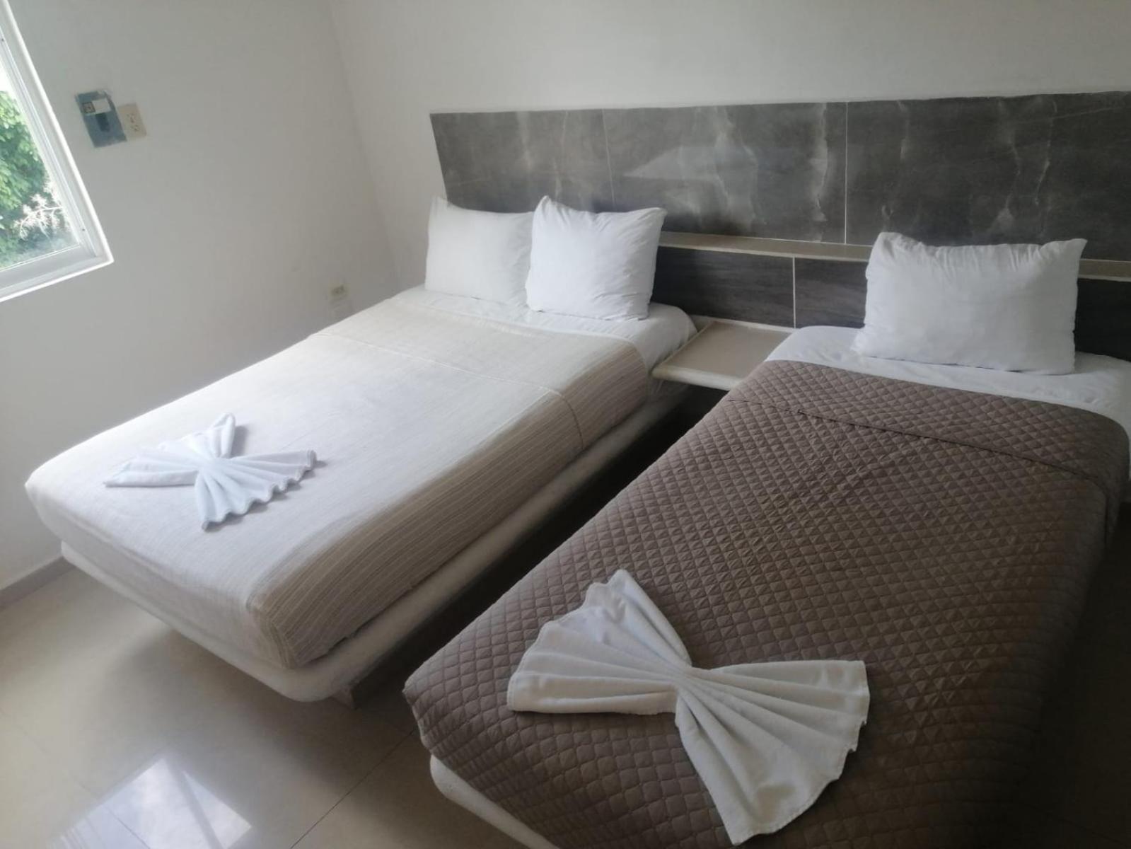 Hotel Dos Mundos, Isla Косумель Экстерьер фото