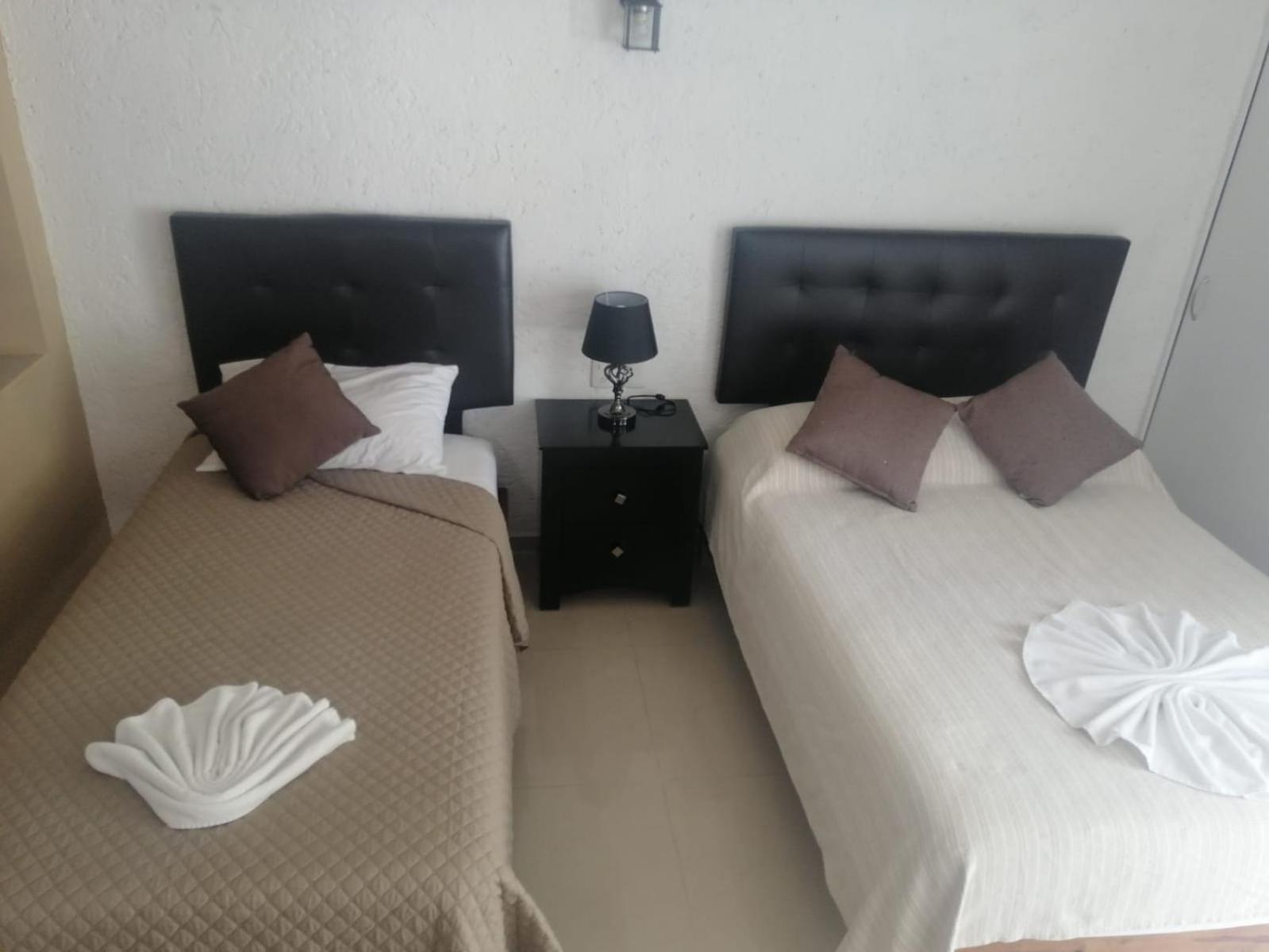 Hotel Dos Mundos, Isla Косумель Экстерьер фото