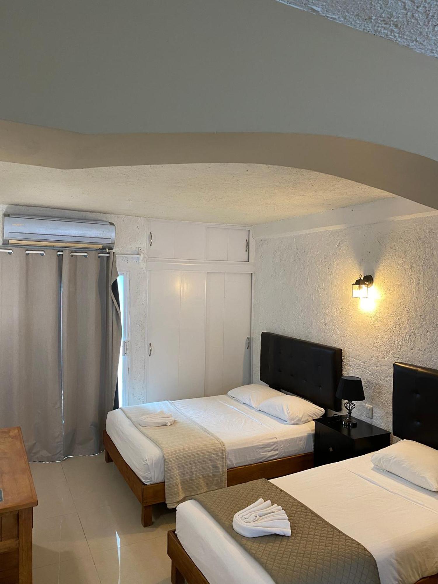 Hotel Dos Mundos, Isla Косумель Экстерьер фото