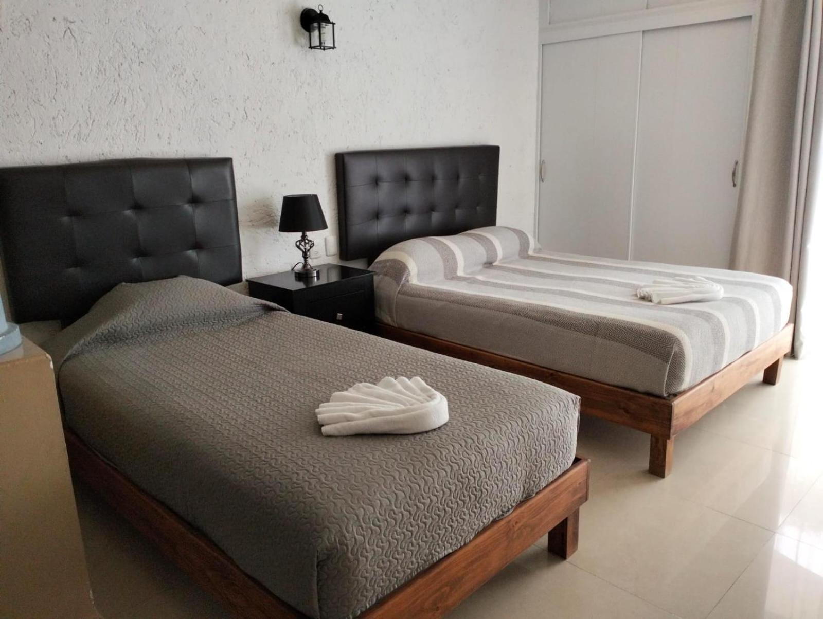 Hotel Dos Mundos, Isla Косумель Экстерьер фото